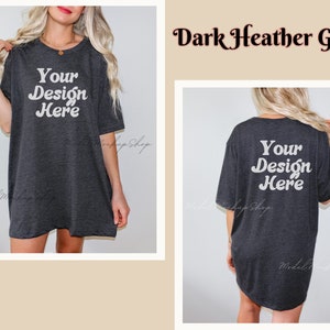 May include: A dark heather grey oversized t-shirt with short sleeves. The shirt has the text "Your Design Here" printed on the front and back in a white retro font.