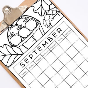 May include: A black and white printable September calendar with a basket of apples and fall leaves in the top left corner. The calendar has spaces for each day of the week, Sunday through Saturday.