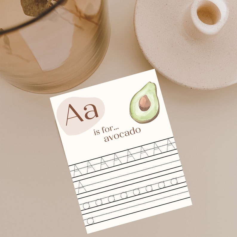 May include: A printable worksheet for learning the letter A. The worksheet features a brown and white illustration of an avocado and the text "Aa is for... avocado". The worksheet includes dotted lines for tracing the letter A.