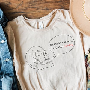 My ADHD Is Chronic but This Ass is Iconic Funny Skull TShirt | Mental Health Awareness Humor | Neurodivergent Adult Merch | Non Binary Gift