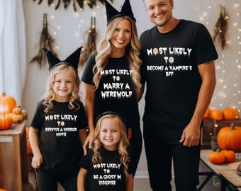 May include: A family of five wearing matching black t-shirts with white text for Halloween. The shirts read "Most Likely To Marry A Werewolf", "Most Likely To Survive A Horror Movie", "Most Likely To Become A Vampire's BFF", and "Most Likely To Be A Ghost In Disguise".