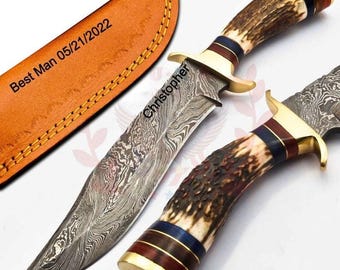 Cuchillo de caza personalizado de acero de Damasco de 10 pulgadas con mango de asta de ciervo y funda de cuero. La forma del clip del mango puede variar respecto a las imágenes.