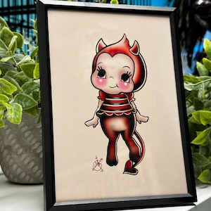 Devil Kewpie Framed Print