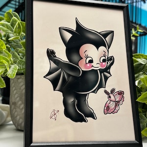 Bat Kewpie Framed Print