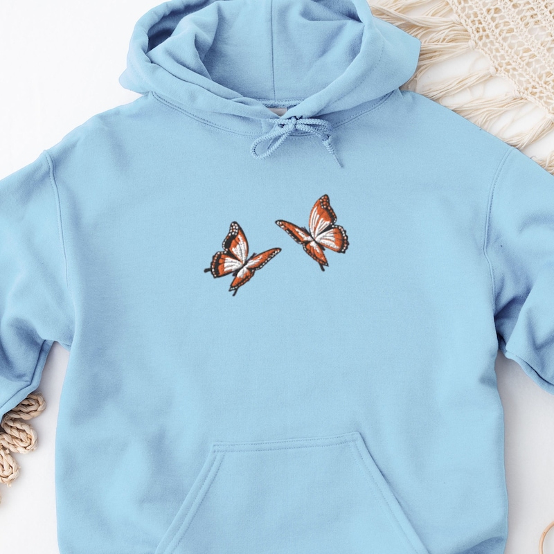 Sweatshirt - FLYRAVE turquoise - Colorful butterfly print main image 0