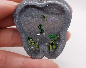 Amuletos para agitar los dientes: tú eliges