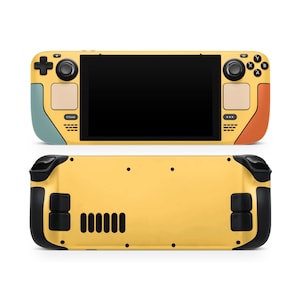 Może przedstawiać: Żółta przenośna konsola do gier z czarnymi przyciskami i czarnym ekranem. Konsola ma teksturowane plecy i przycisk "STEAM" z przodu.