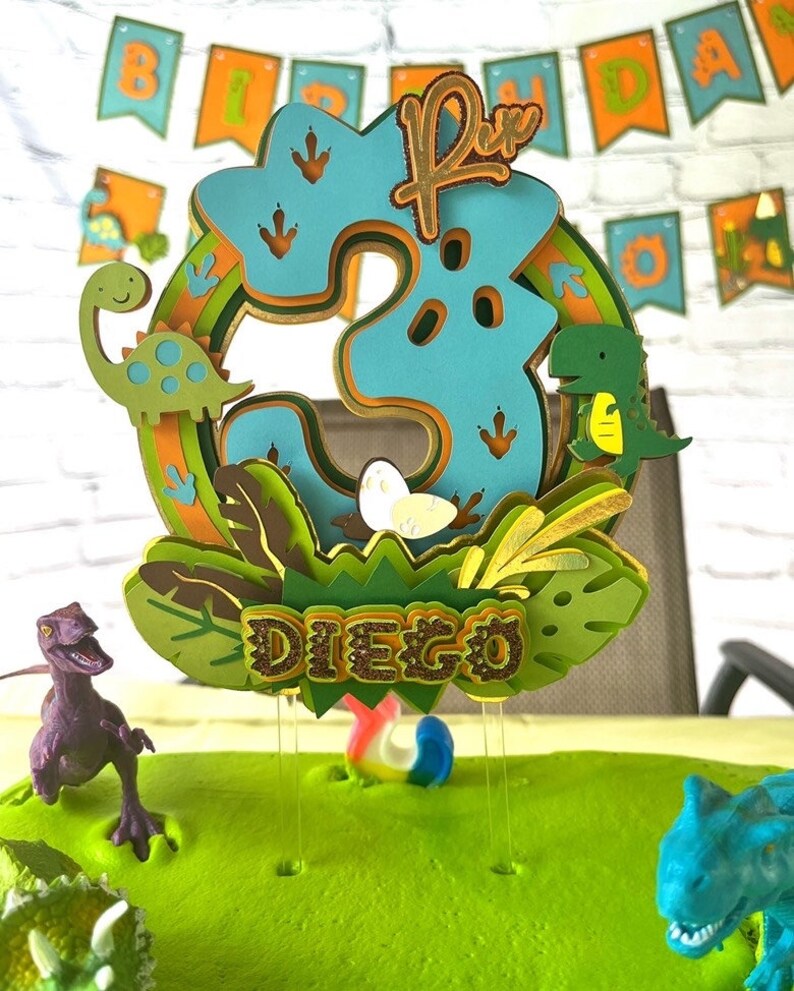 JOYMEMO Dinosaur Three Rex Cake Topper & Banner - Green & Black Glitter For 3rd Birthday Party
