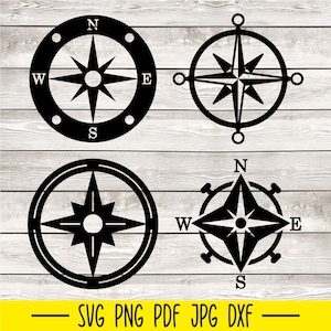 Puede incluir: Cuatro diseños de brújula negros con las direcciones cardinales N, S, E y W. Los diseños de brújula están sobre un fondo de madera blanca.