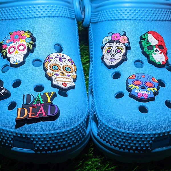 SKULL SHOE CHARM clips for croc like clogs. A variety of cool Sugar skulls with and without cute flowers to decorate your shoes.