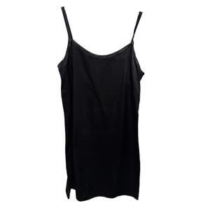 May include: A solid black slip dress featuring a scoop neckline and thin spaghetti straps. The garment has a smooth, slightly reflective finish and a straight, simple silhouette that hangs vertically from the shoulder straps.