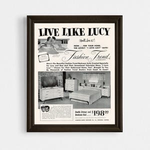 May include: Black and white vintage advertisement for a bedroom furniture set. The ad features a photo of a bedroom set with a double dresser, bookcase bed, and two nightstands. The ad text reads "Live Like Lucy (You'll Love It!) Now... For Your Home, The Lovely "I Love Lucy" Suite! Fashion Trend." The ad also includes the price of the furniture set, $198.00.