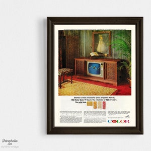 May include: A vintage advertisement for RCA Victor Color TV featuring a wood-paneled entertainment center with a television set displaying a blue screen with a fish swimming. The text reads "America's most successful space programs have it: RCA Victor Color TV has the reliability of RCA circuitry. The solid kind." and "COLOR".