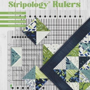May include: A clear acrylic quilting ruler with the text "Master Your Stripology Rulers" and sample fabric squares in blue, green, and white. The ruler has measurement markings and the text "GE Designs".