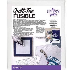 May include: White package of Quilt-Tee Fusible, a 100% woven cotton interfacing for T-shirt projects. Instructions and examples are shown, including an iron, a rotary cutter, and a finished shirt. The package measures 60 inches by 72 inches.
