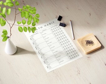 May include: A printable health habit tracker with sections for meal planning, workout, and water intake. The tracker has a simple design with black text on a white background.