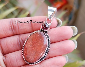 Handmade Sunstone Pendant: 925 Sterling Silver & Garnet Accent