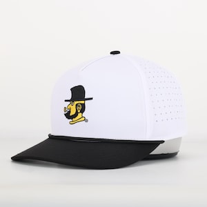 May include: White and black baseball cap with a yellow and black cartoon character wearing a hat and smoking a pipe. The cap has a black brim and a white mesh back.