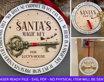 May include: A round wooden sign with a white border and the text "Our Christmas Tree - We Have No Chimney As You Can See - So Here Is A Magic Key To Put Some Presents Under Our Christmas Tree - We Have No Chimney As You Can See - So Here Is A Magic Key To Put Some Presents Under"  surrounding a decorative gold key with a red ribbon. The sign also includes the text "Santa's Magic Key" and "For Lucy's House".
