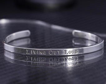 5.75”, vintage designer PKP sterling silver hammered 925 cuff bracelet engraved “living out loud”, stamped Ster PKP