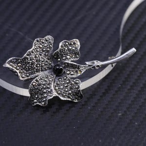 Vintage sterling silver 925 handmade flower brooch with onyx and marcasite, stamped 925