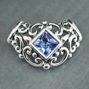 Vintage sterling silver 925 handmade filigree V shaped pendant with blue crystal, stamped 925