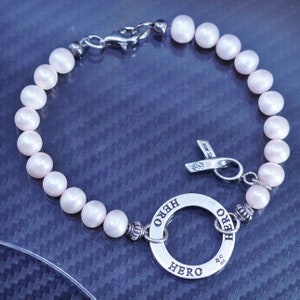 7”, vintage sterling silver 925 handmade pearl bracelet with breast cancer survivor ribbon charm engraved “hero”, stamped 925