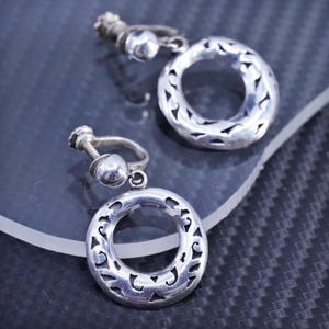 Vintage Mexican sterling silver 925 handmade screw back earrings with circle dangles. Stamped 925 Mexico