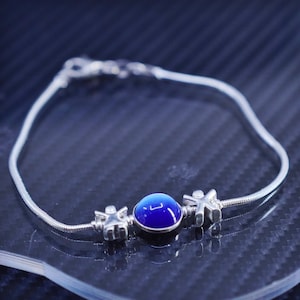 7”, vintage sterling silver 925 handmade snake chain bracelet with blue cats eye and boy girl charms, stamped 925