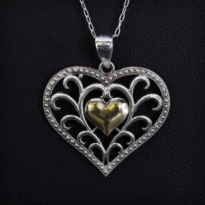 21”, Vintage two tone sterling silver 925 circle necklace, with 10K yellow gold heart pendant, stamped 925 10K