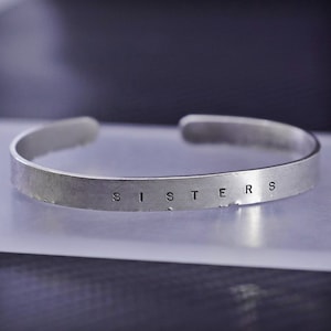 5.75”, vintage southwestern sterling silver 925 cuff, simple bracelet embossed “sister”, silver tested