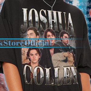 May include: Black unisex t-shirt featuring the text "JOSHUA COLLEN" above a collage of images. The shirt is oversized and has short sleeves. The model is wearing a 2XL shirt.