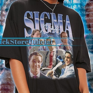 May include: A black oversized t-shirt with a graphic print of a group of men with the text "SIGMA" and "Male" printed on the front. The graphic is in a retro style with a blue and white color scheme.