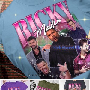 May include: Light blue t-shirt featuring a graphic of Ricky Martin with the name "Ricky Martin" in pink. The shirt has a vintage design with multiple images of the singer. Additional color options are shown below the main image.
