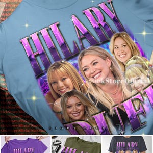 May include: Light blue t-shirt featuring the name "HILARY" in a purple, reflective font, with images of Hilary Duff. The shirt has a "Top Quality" seal. Additional color options are purple, military green, and charcoal.