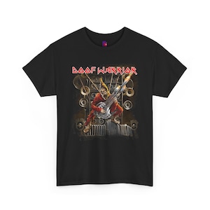 May include: Black t-shirt featuring a graphic print of a red figure playing a guitar in front of a wall of speakers. The text "DOOF WARRIOR" is printed in red at the top of the graphic.