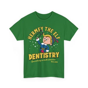 May include: Green t-shirt with a cartoon elf holding a pair of pliers. The text on the shirt reads "Hermey the Elf Dentistry specializing in tooth extraction Since 1964."