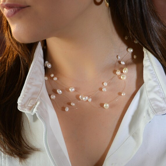 Invisible pearl best sale necklace