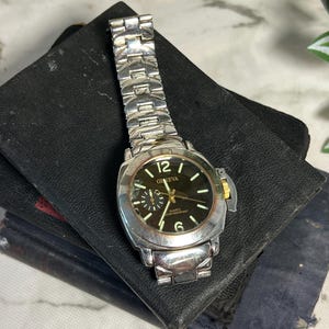 Vintage Men’s Geneva Wrist Watch Silver Tone Stainless Steel Water Resistant Back Japan Movement