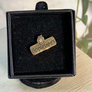 Applebees Company Logo Pin Employee Store Service Stone in the Apple