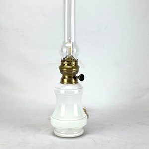 Antique oil lamp adapted to electricity