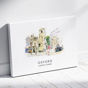 May include: A watercolor painting of Carfax Tower in Oxford, England. The tower is a tall, slender building with a clock face and a spire. The painting is done in a light, airy style, with a soft palette of colors. The text "Oxford Carfax Tower" is printed below the image.