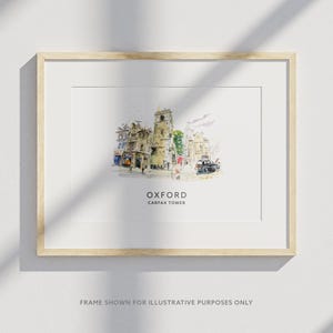 May include: A watercolor illustration of Carfax Tower in Oxford, England. The tower is a historic landmark and is surrounded by other buildings. The illustration is in a light brown frame.