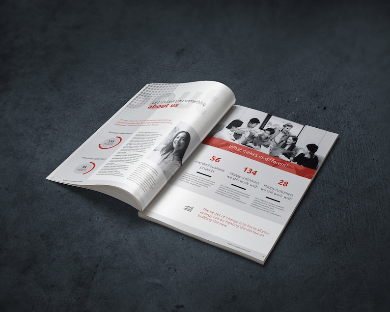 May include: A magazine spread with a red and white color scheme. The text on the page reads "What makes us different?" and lists three numbers: 56, 134, and 28. The text below the numbers reads "The secret of change is to focus all your energy not on fighting the old but on building the new."