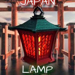 May include: A red and green Japanese-style lamp with a traditional design. The lamp is lit and glowing, and the light shines through the intricate latticework. The lamp is set against a backdrop of a red Japanese gate.