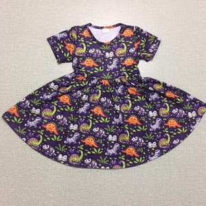 Halloween-twirly-jurk dinosaurus