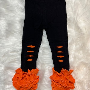 Black and Orange Distressed Icing Ruffle Legging