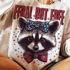 4 juillet raton laveur PNG, Merica drôle mignon raton laveur quatrième de juillet Sublimation Design, tendance aux États-Unis d'Amérique populaire PNG, téléchargement numérique drôle