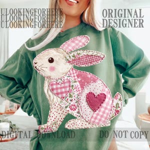 May include: A green sweatshirt featuring a patchwork bunny design. The bunny has pink gingham and floral patterned accents, a heart-shaped patch, and a cream-colored face. The words "ORIGINAL DESIGNER" and "DIGITAL DOWNLOAD DO NOT COPY" are visible.