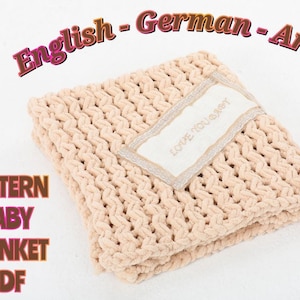 May include: A beige knitted baby blanket with a white tag that says "Love You Baby". The blanket is folded in half and has a textured knit pattern. The image is labelled "Pattern Baby Blanket PDF" in the bottom left corner.
